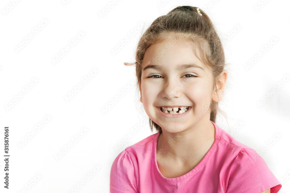 Portrait of happy smiling child girl isolated on white background. Laughing people. Positive emotions.