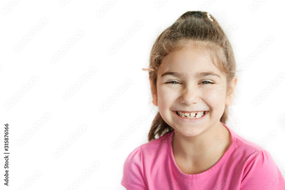 Portrait of happy smiling child girl isolated on white background. Laughing people. Positive emotions. Portrait of happy smiling child girl isolated on white background. Laughing people. Positive emotions.