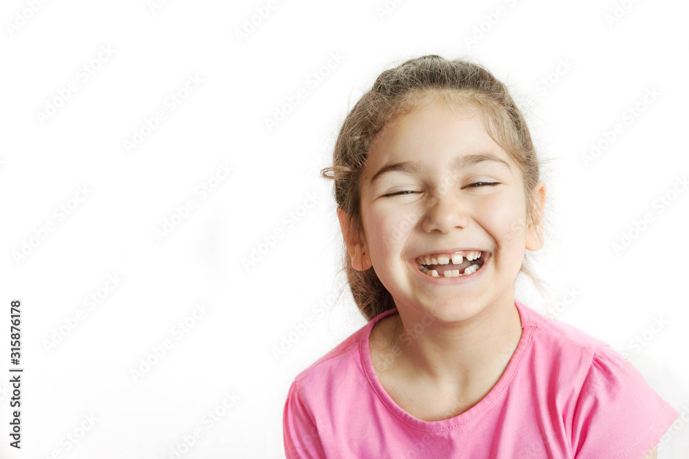 Portrait of happy smiling child girl isolated on white background. Laughing people. Positive emotions. Portrait of happy smiling child girl isolated on white background. Laughing people. Positive emotions.