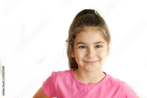 Portrait of happy smiling child girl isolated on white background. Laughing people. Positive emotions.