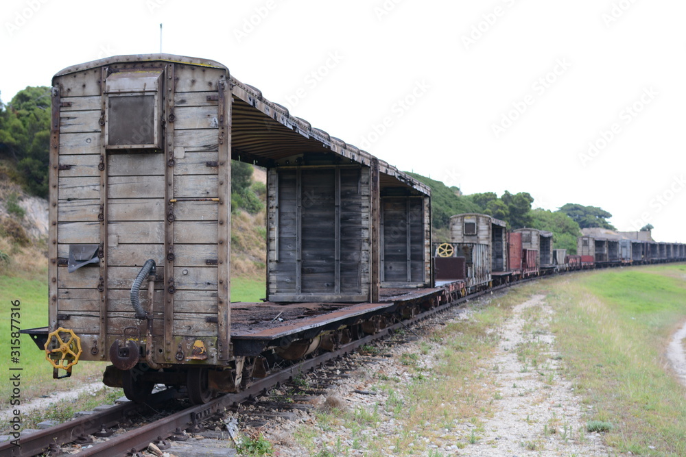 Old train carriage on railway Old train carriage on railway