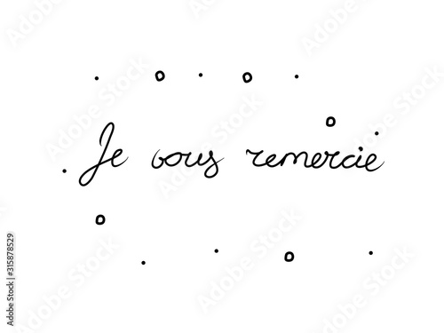 Je vous remercie phrase handwritten with a calligraphy brush. Thanks in French. Modern brush calligraphy. Isolated word black