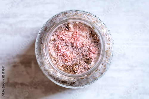 Topview of a glass container with fruiting fungal mycelium, mushroom cultivation and fungiculture photo