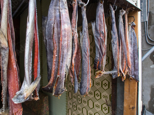Traditional air dried salmon hung up for sale in Hokkaido, Japan