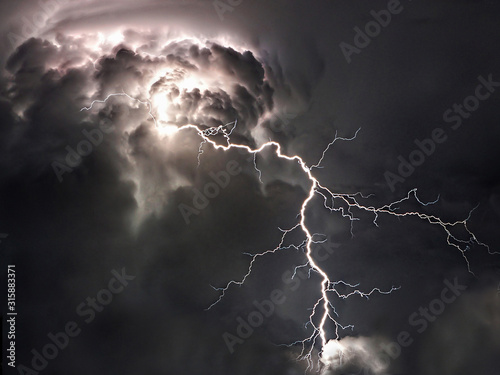 Lightning bolts and storm clouds