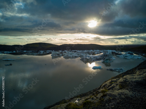 Lake with ice blocks at sunset in Iceland