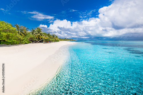Fototapeta Naklejka Na Ścianę i Meble -  Beautiful tropical beach landscape banner. White sand and coco palms wide panorama background concept. Amazing beach scene use for summer vacation and exotic holiday, luxury travel tourism destination