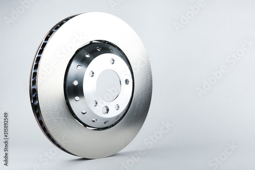 backdrop with brake disk on white background with copy space