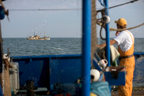 Fishermen fishing boat. Ukraine, Sea of Azov, industrial fishing