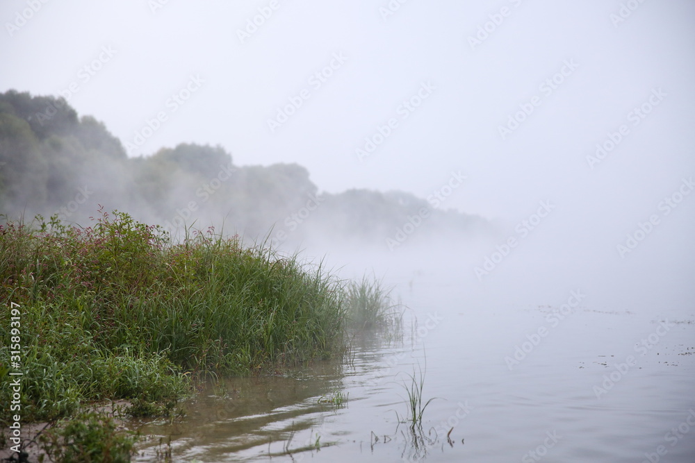 fog over the river in the morning fog over the river in the morning