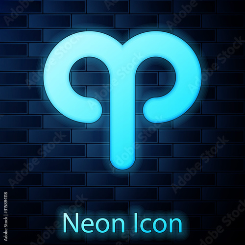 Glowing neon Aries zodiac sign icon isolated on brick wall background. Astrological horoscope collection. Vector Illustration