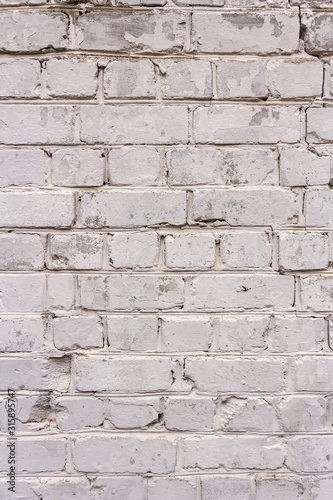 The texture of the old brick. Vertical photo. Space for text