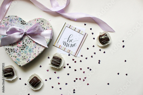 Valentine’s Day. Be mine. Chocolate surprises. Flat lay concept.