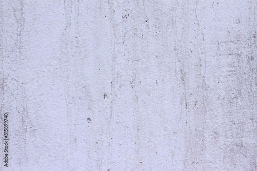 white wall with paint, scuffs and old white