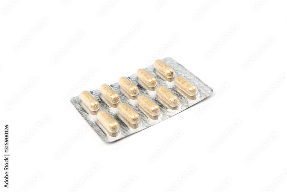 Herbal capsules isolated on white background. Herbal capsules isolated on white background.