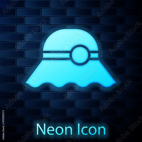 Glowing neon Elegant women hat icon isolated on brick wall background. Vector Illustration