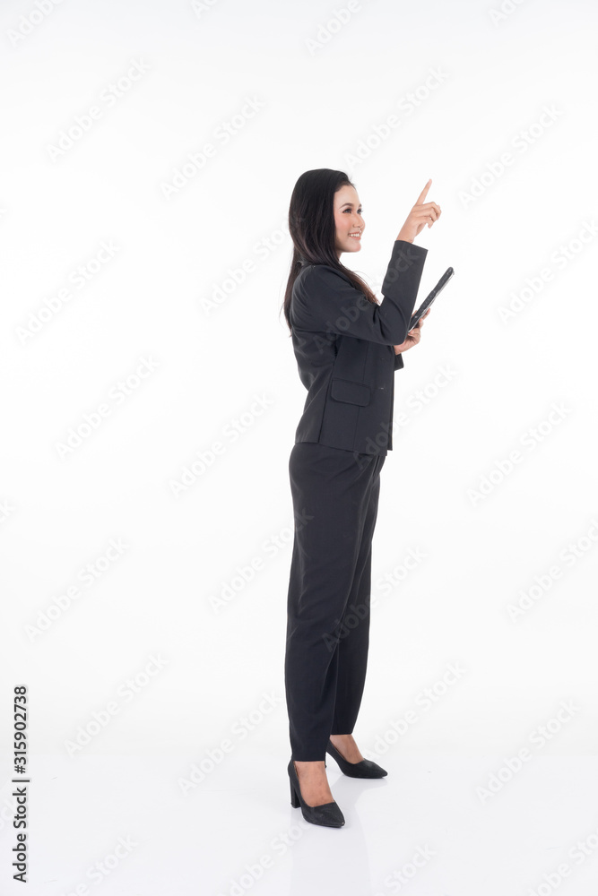 An attractive woman wearing business attire holding a tablet with various poses isolated on white background. Suitable for image cut out and manipulation works for technology,business or finance theme An attractive woman wearing business attire holding a tablet with various poses isolated on white background. Suitable for image cut out and manipulation works for technology,business or finance theme