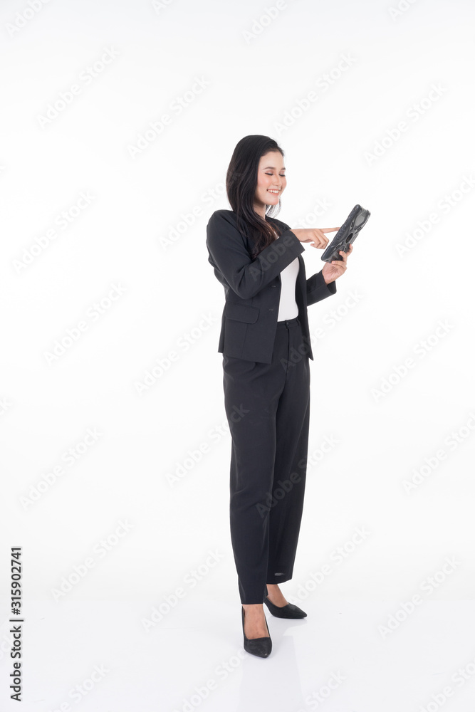 An attractive woman wearing business attire holding a tablet with various poses isolated on white background. Suitable for image cut out and manipulation works for technology,business or finance theme An attractive woman wearing business attire holding a tablet with various poses isolated on white background. Suitable for image cut out and manipulation works for technology,business or finance theme
