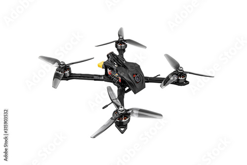 Modern FPV drone on a white background. Four-engine aircraft on the radio control. Drone for racing, filming and entertainment.