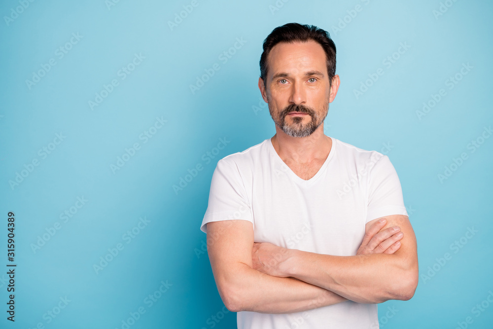 Portrait of his he nice attractive serious brunette mature guy freelancer system administrator folded arms isolated over bright vivid shine vibrant teal green blue turquoise color background Portrait of his he nice attractive serious brunette mature guy freelancer system administrator folded arms isolated over bright vivid shine vibrant teal green blue turquoise color background