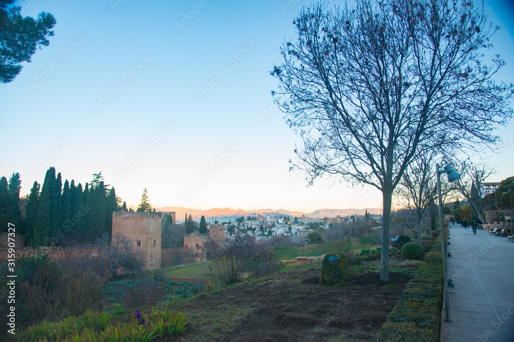 GRANADA, SPAIN - February 5, 2019: La Alhambra is UNESCO World Heritage site in Granada, Spain. Spain is an European country which has many touristic places.. GRANADA, SPAIN - February 5, 2019: La Alhambra is UNESCO World Heritage site in Granada, Spain. Spain is an European country which has many touristic places..