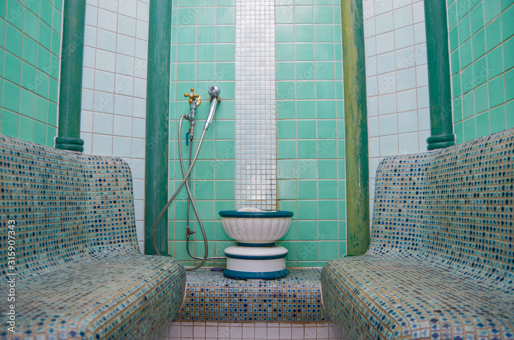 Steam sauna or Turkish bath or Hammam inside wellness or spa area on