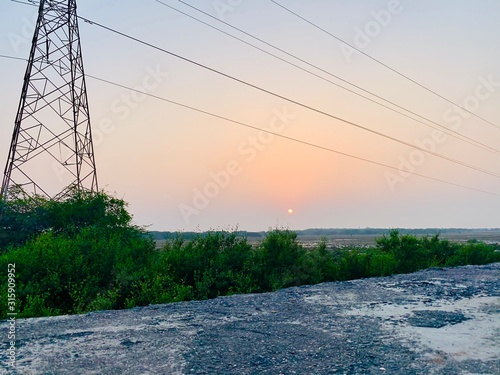 Obraz na plátně wonderfull sunset at the dumas beach of the city of sun surat