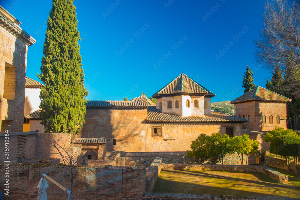 GRANADA, SPAIN - February 5, 2019: La Alhambra is UNESCO World Heritage site in Granada, Spain. Spain is an European country which has many touristic places..