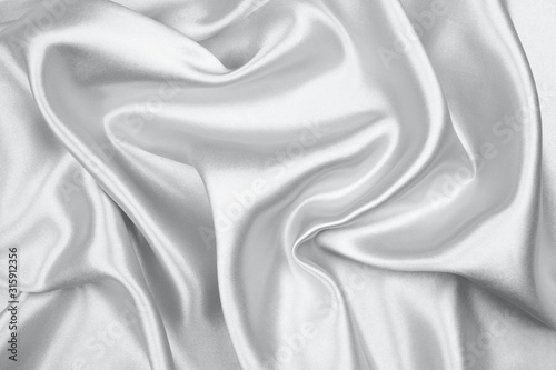 Silver silk texture luxurious satin for abstract background