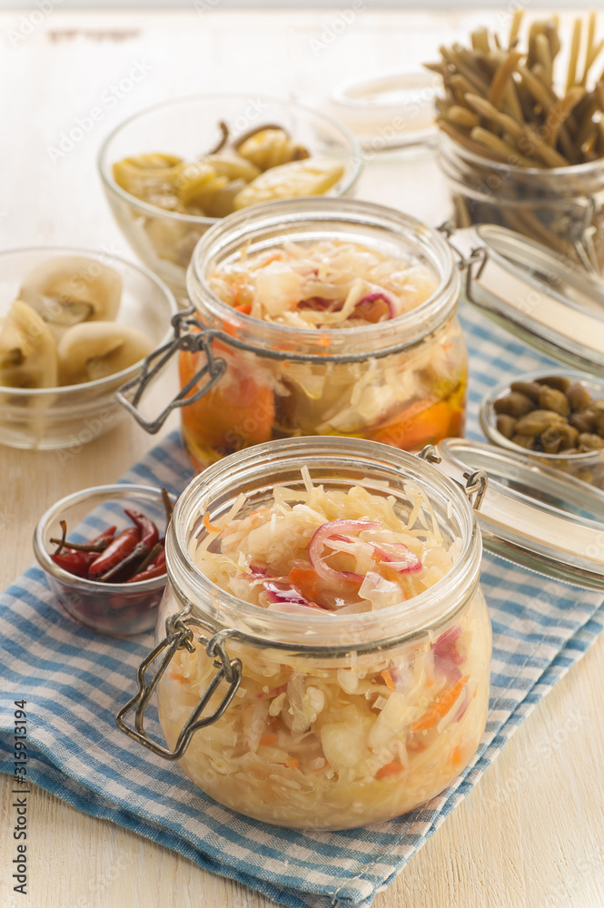 Homemade canned pickled and fermented vegetables for long-term storage. Homemade canned pickled and fermented vegetables for long-term storage.
