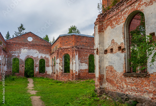 Ruined Lutheran church in Lahdenpohja, Karelia, Russia. Destroyed protestant temple in summer day. Architectural landmark in northern Russian town with Finnish heritage. Background for history theme © Tatyana_Andreyeva