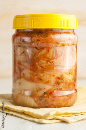 Homemade canned pickled and fermented vegetables for long-term storage.