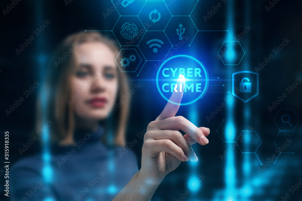 Business, Technology, Internet and network concept. Young businessman working on a virtual screen of the future and sees the inscription: Cyber crime Business, Technology, Internet and network concept. Young businessman working on a virtual screen of the future and sees the inscription: Cyber crime