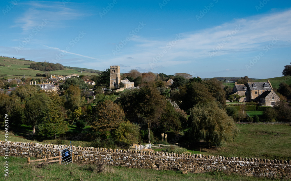 Abbotsbury in Dorset Landscape with Church in the distance.  Beautiful  Dorset countryside landscape  in England.