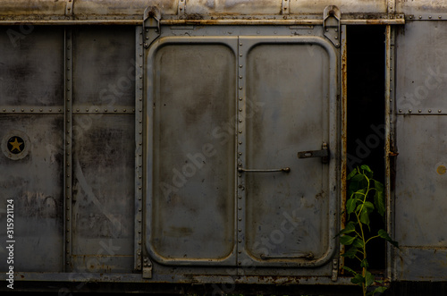 Vintage railroad container doors without rusty and old color at station. © num