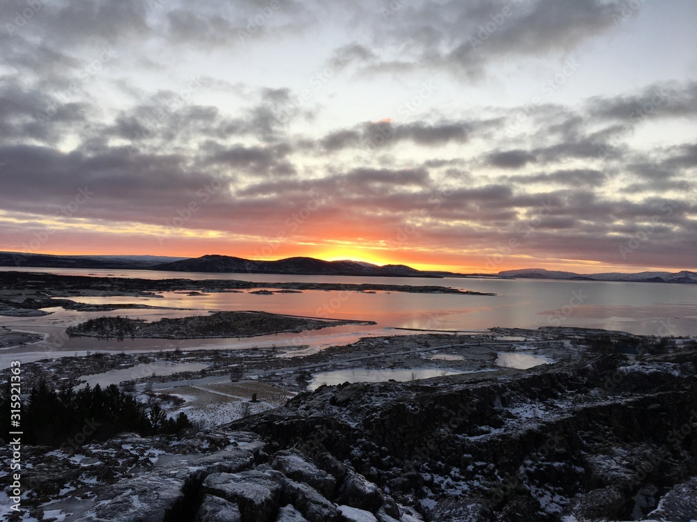 Iceland Winter, orange Sunrise, frozen lakes, snow, sky