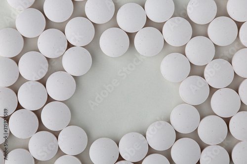 Pills tablets vitamins capsules drugs white close up macro shot