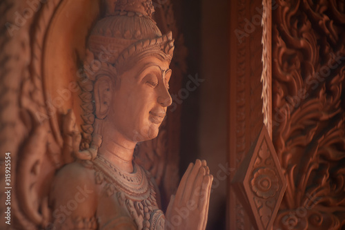 Beautiful buddha stucco tracery sculpture public place in thialnd temple © Art789
