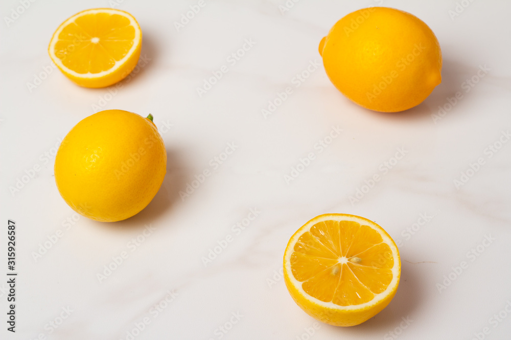 fresh lemons on a white background fresh lemons on a white background