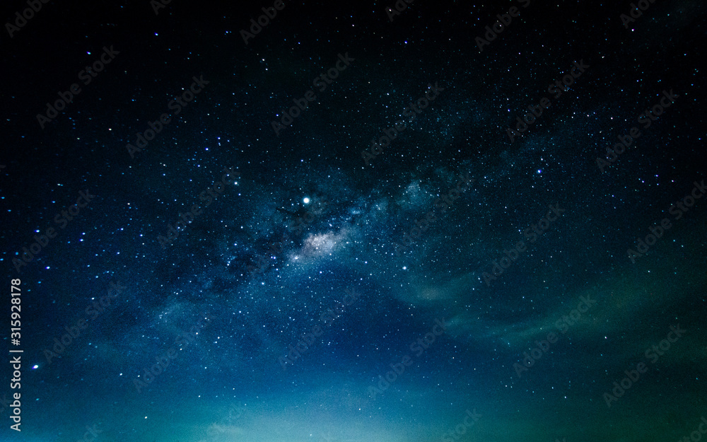 Fototapeta premium Milky way galaxy with stars and space in the universe background at thailand