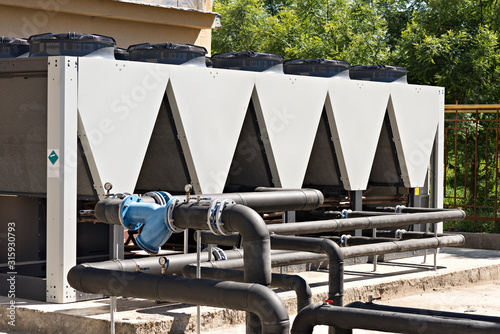 Air cooled water chillers installed on the ground below
