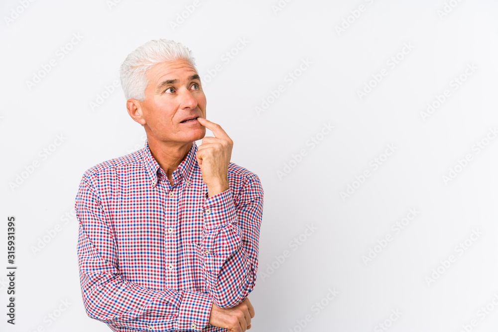 Senior caucasian man isolated looking sideways with doubtful and skeptical expression. Senior caucasian man isolated looking sideways with doubtful and skeptical expression.