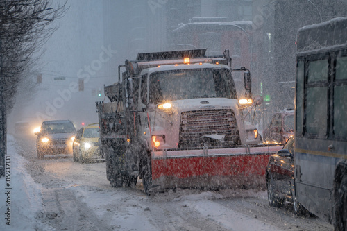 Plow truck in snow storm 
