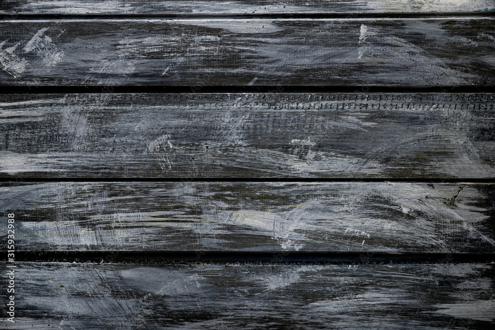 Fototapeta premium Worn black and white horizontal boards top view