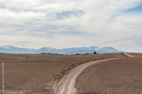 Dirt road through Agafay desert  Morocco