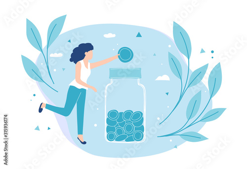 Girl puts a coin in a moneybox. Savings and investing money