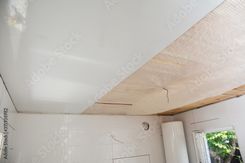 PVC Ceiling Panels, Cladding Installation. Installing, renovate, repair white PVC Ceiling Boards in the bathroom