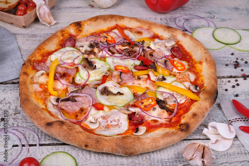 pizza with tomatoes and pepper