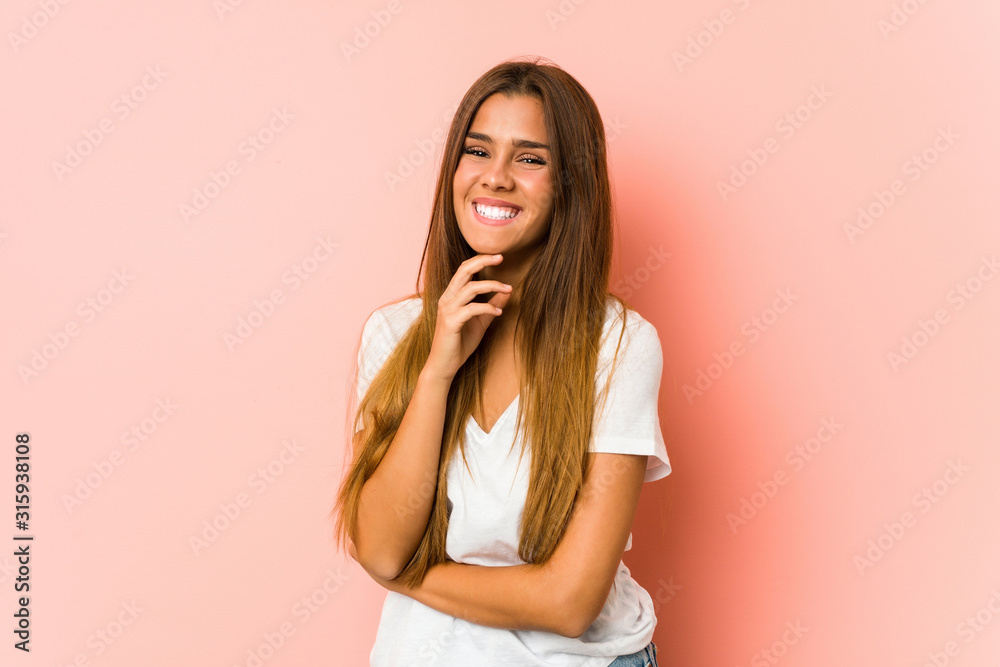 Fototapeta premium Young caucasian woman doing beauty poses isolated