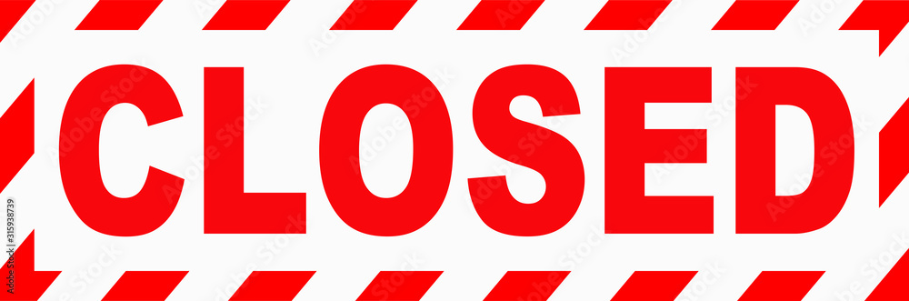 A simple signboard that says : closed in red color. A simple signboard that says : closed in red color.